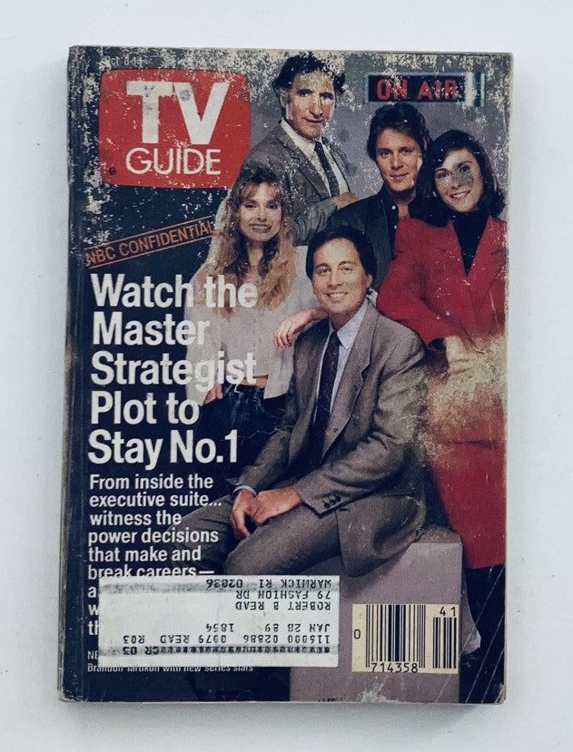 TV Guide Magazine from October 8, 1988 featuring Brandon Tartikoff on the cover. The magazine discusses the strategies behind network television success and includes images of prominent figures in the industry. It's in fair condition with visible wear, especially on the sides.