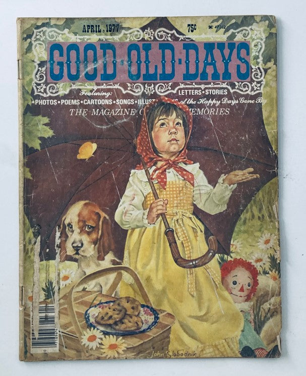 Cover of Good Old Days Magazine, April 1977 Vol 13 No. 10 featuring a child holding an umbrella, a beagle dog, and a basket of cookies amidst flowers, representing nostalgia and vintage themes.