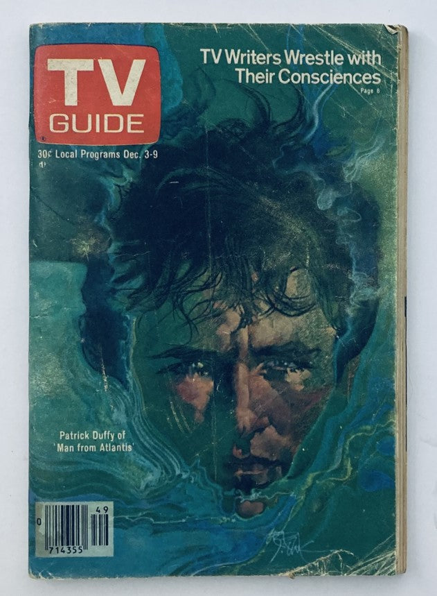 Cover of TV Guide Magazine from December 3, 1977, featuring Patrick Duffy from 'Man from Atlantis.' The magazine has visible creases and a colorful design, showcasing the title TV Guide.