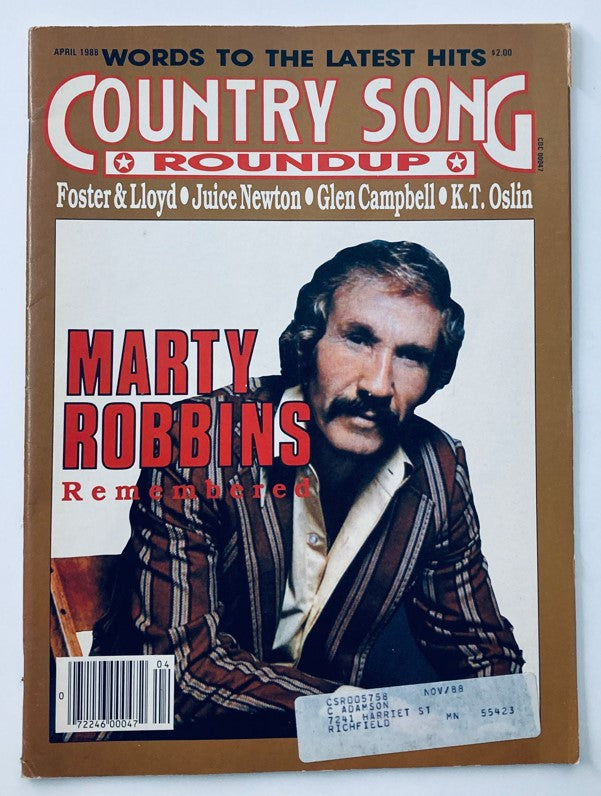 Cover of VTG Country Song Roundup Magazine April 1988 featuring a tribute to Marty Robbins with bold text 'Marty Robbins Remembered' and images of country music stars.