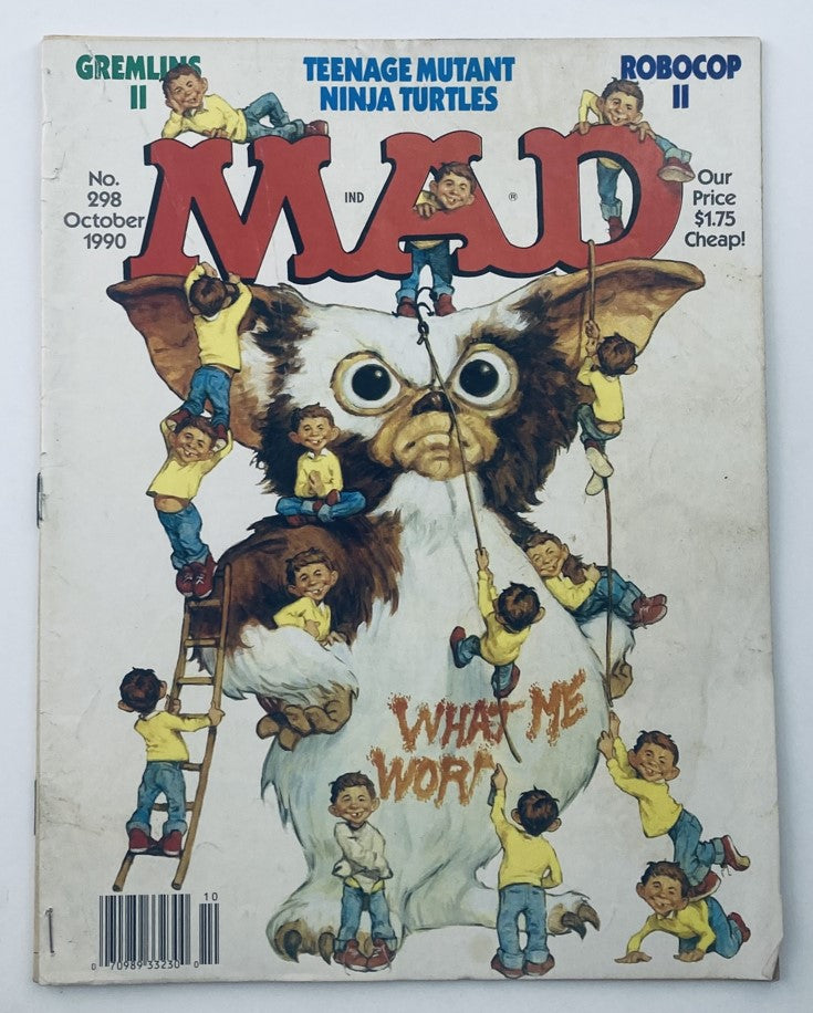 Mad Magazine October 1990 No. 298 featuring Gremlins II on the cover, showcasing a whimsical illustration of the Gremlin character and playful children engaging with it. An essential collectible for vintage magazine enthusiasts.