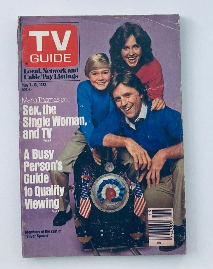 Cover of TV Guide Magazine from May 7, 1983 featuring the cast of 'Silver Spoons'. The magazine displays the title 'TV Guide', listing local, network, and cable/pay listings, with a thematic photo of three smiling individuals, one in a blue sweater, on a small train model, promoting TV shows and entertainment.