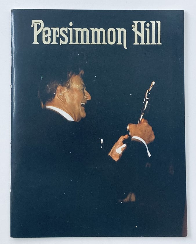 Cover of the VTG Persimmon Hill Magazine 1979 Vol 9 No. 2 featuring John Wayne, showcasing a smiling John Wayne holding an award.