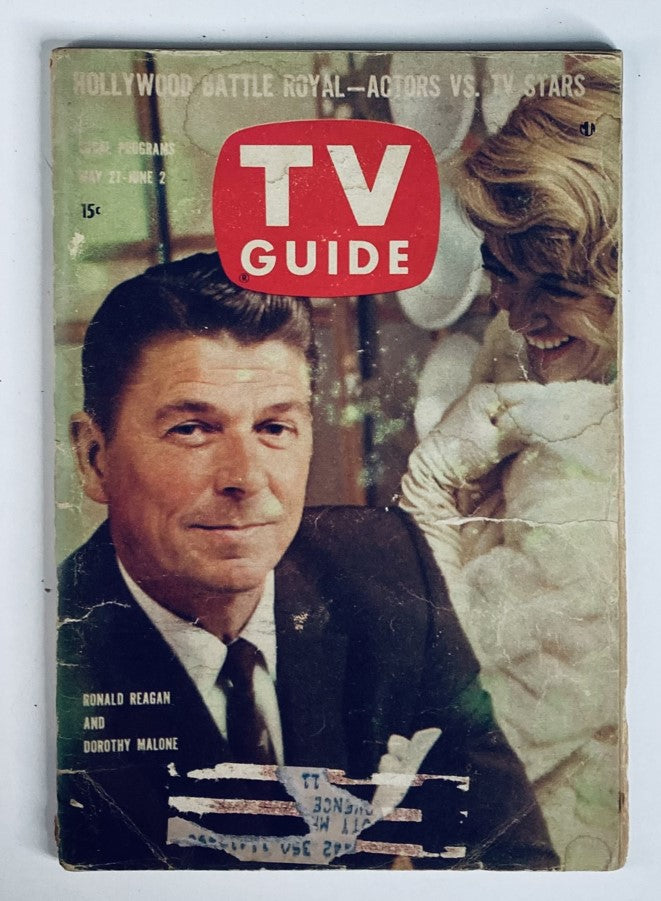 Cover of TV Guide Magazine from May 27, 1961, featuring Ronald Reagan and Dorothy Malone, showcasing vintage entertainment history.
