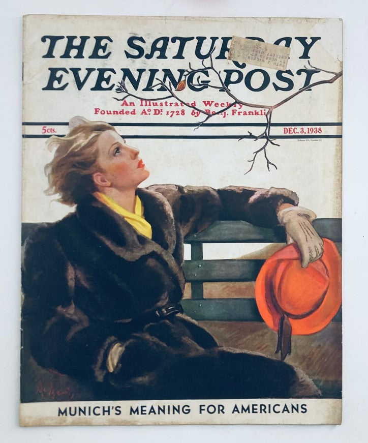 Cover of The Saturday Evening Post Magazine December 3 1938 featuring a woman in a fur coat and yellow scarf, with a bright orange hat, under the title "Munich's Meaning for Americans."
