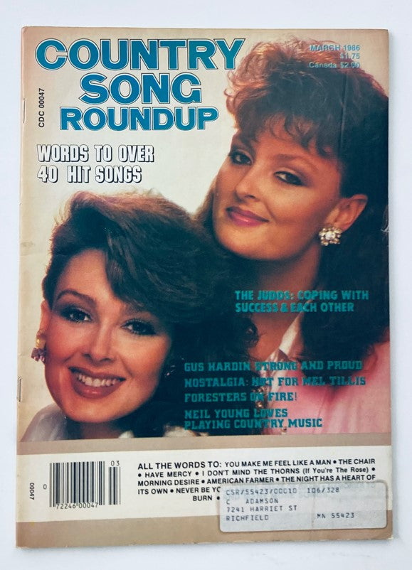 Cover of VTG Country Song Roundup Magazine March 1986 featuring The Judds titled 'Coping with Success'. Includes details of songs and articles within.