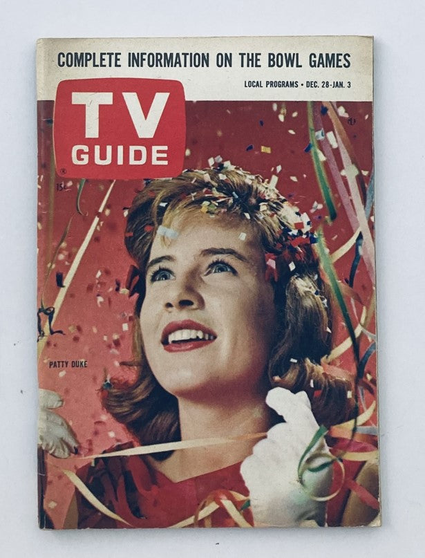 Cover of TV Guide Magazine December 28 1963 #561 featuring Patty Duke celebrating with confetti. A classic piece of television history.