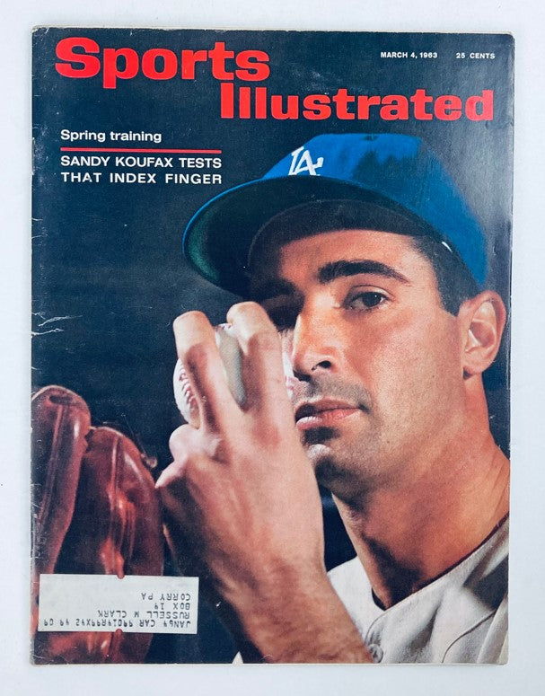 Cover of Sports Illustrated Magazine March 4, 1963, Vol 18 No. 9 featuring Sandy Koufax, a Los Angeles Dodgers pitcher, holding a baseball and preparing to pitch.