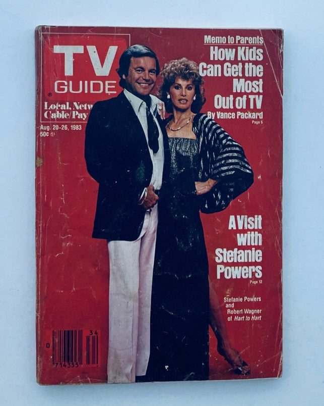 TV Guide Magazine August 20 1983 featuring Stefanie Powers and Robert Wagner. This vintage magazine cover showcases the actors along with a headline about a visit with Stefanie Powers. Ideal for collectors of television history.