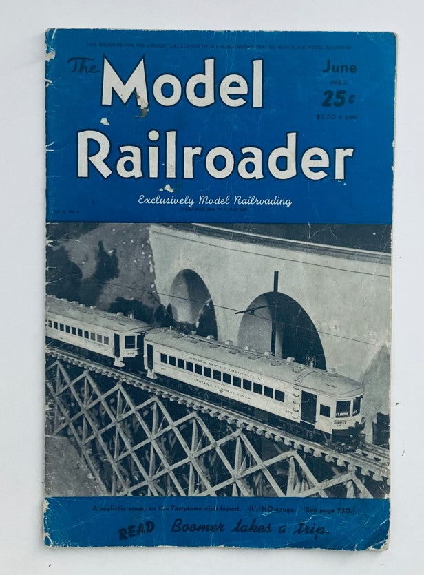 Vintage Model Railroader Magazine cover from June 1942, Volume 9, Number 6, featuring the article 'Boomer Takes a Trip'. The cover displays a scenic black and white illustration of model trains crossing a trestle bridge.