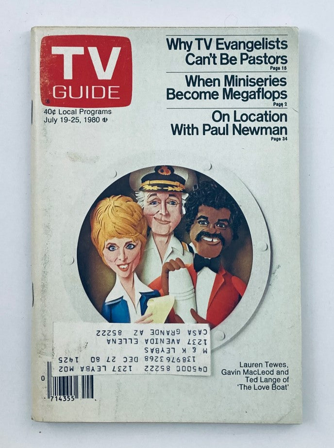 TV Guide Magazine July 19 1980 featuring Lauren Tewes, Gavin MacLeod, and a cartoon character, highlighting articles on TV evangelists and miniseries. A collectible item in pristine condition.
