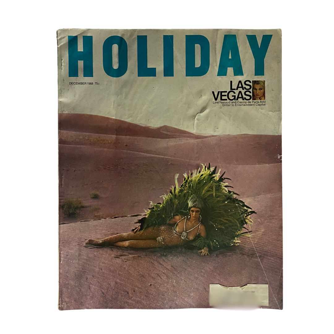 Cover of VTG Holiday Magazine December 1968 Vol 44 No. 6 featuring a glamorous design that represents Las Vegas as the entertainment capital, showcasing a model adorned with foliage in a desert setting.