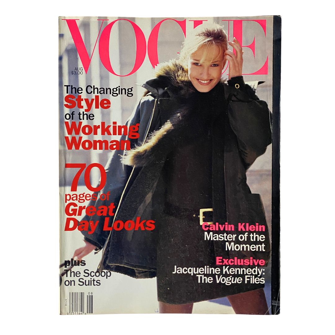 Vogue Magazine August 1994 cover featuring iconic model Karen Mulder, photographed by Steven Meisel. The cover highlights 'The Changing Style of the Working Woman' and showcases a fashionable look from the 90s.