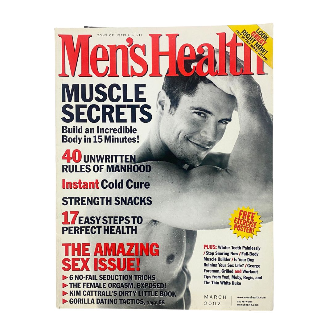 Men's Health Magazine March 2002 featuring muscle secrets and health tips with an image of a fit model on the cover showcasing a well-defined physique.