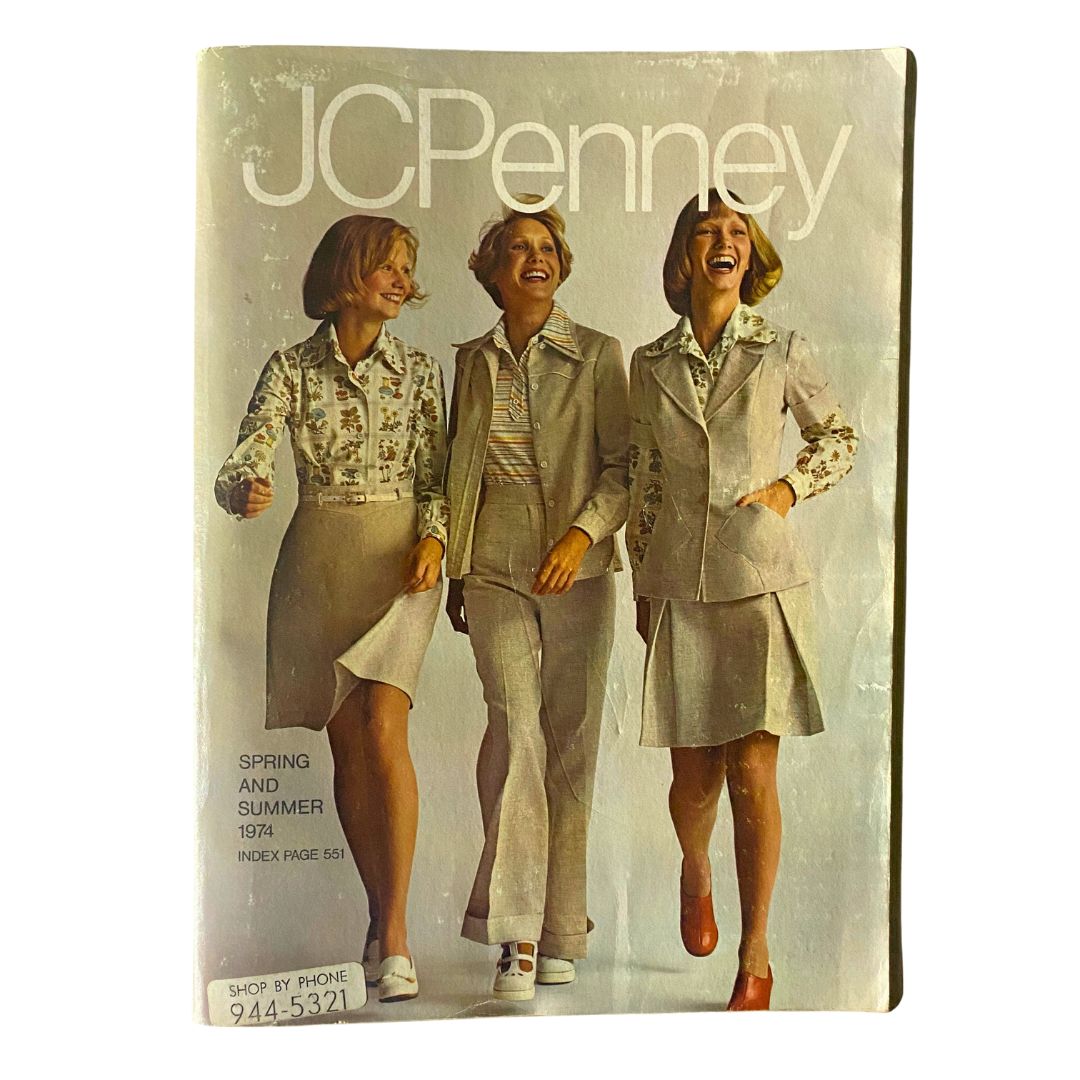 Cover of the 1974 JCPenney Spring and Summer Catalog featuring three stylish women in vibrant outfits, showcasing fashion from the era.