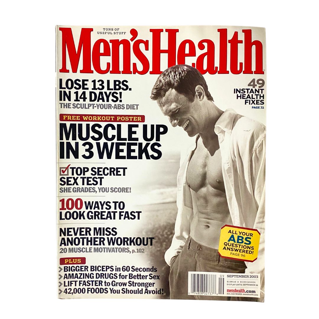 Men's Health Magazine September 2003 cover featuring the headline 'Muscle Up in 3 Weeks'. The cover promotes weight loss and fitness tips, including a free workout poster and articles on achieving bigger biceps and improving workout efficiency.