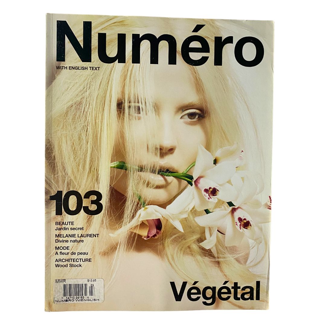 Cover of Numéro Magazine May 2009 No. 103 featuring model Magdalena Frackowiak, showcasing a stunning floral design and contemporary fashion aesthetics.