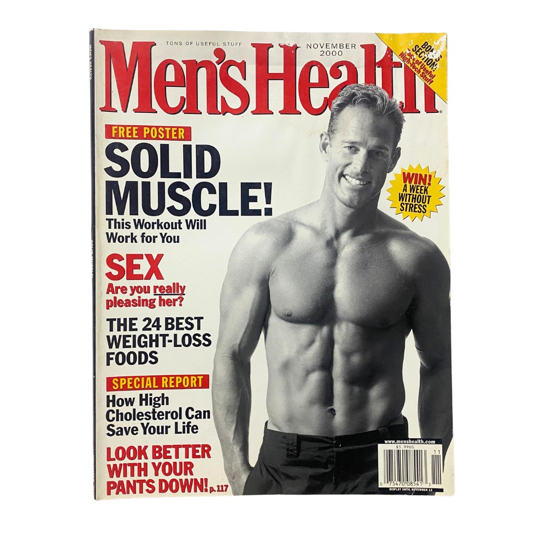 Men's Health Magazine November 2000 featuring a fit model on the cover, promoting articles on solid muscle workouts and the best weight-loss foods.