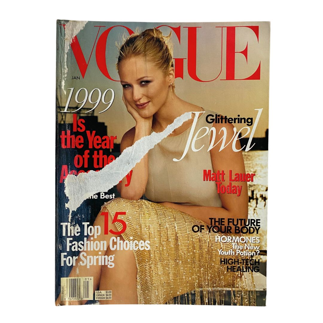Cover of Vogue Magazine January 1999 featuring the title 'Glittering Jewel' by Steven Meisel, showcasing a model with a golden outfit, representing iconic late 90s fashion.