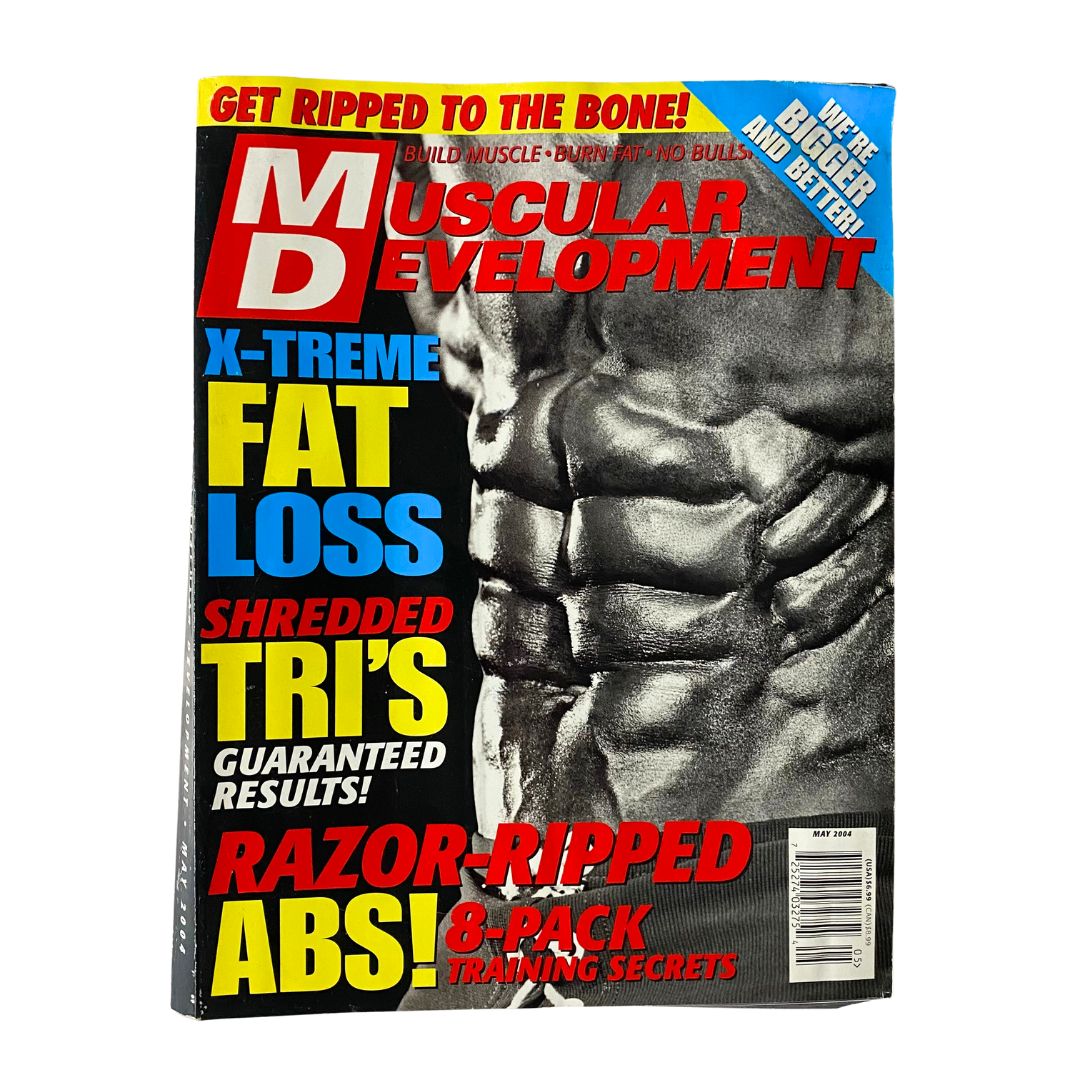 Muscular Development Magazine May 2004 showcasing the cover featuring 'Razor-Ripped Abs Secrets' with striking black and white imagery highlighting abs. Ideal for fitness enthusiasts and collectors.