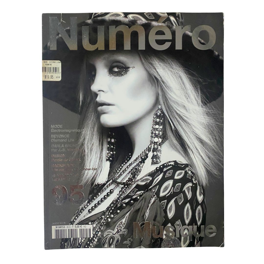 Numéro Magazine August 2008 cover featuring Heidi Mount, showcasing a stunning black and white portrait with intricate details and artistic flair.