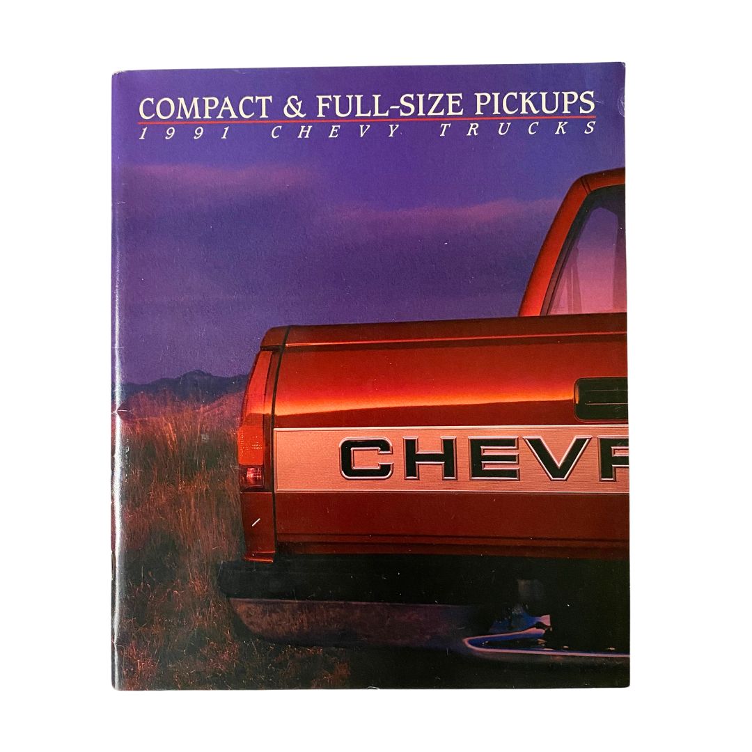 Cover of the 1991 Chevrolet Chevy Trucks Compact & Full-Size Pickups Brochure Guide Catalog featuring a close-up of a Chevy truck's rear, showcasing the CHEVY logo, against a scenic backdrop.