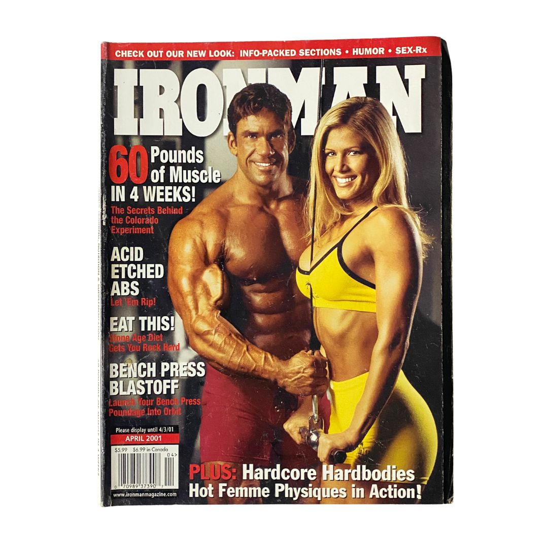 Iron Man Magazine April 2001 Cover featuring Torrie Wilson and Joe DeAngelis, showcasing fitness and wrestling culture.