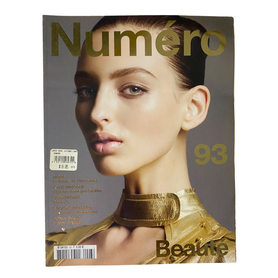 Cover of Numéro Magazine May 2008 No. 93 featuring Georgina Stojiljkovic, showcasing a fashion model with elegant makeup and golden clothing.