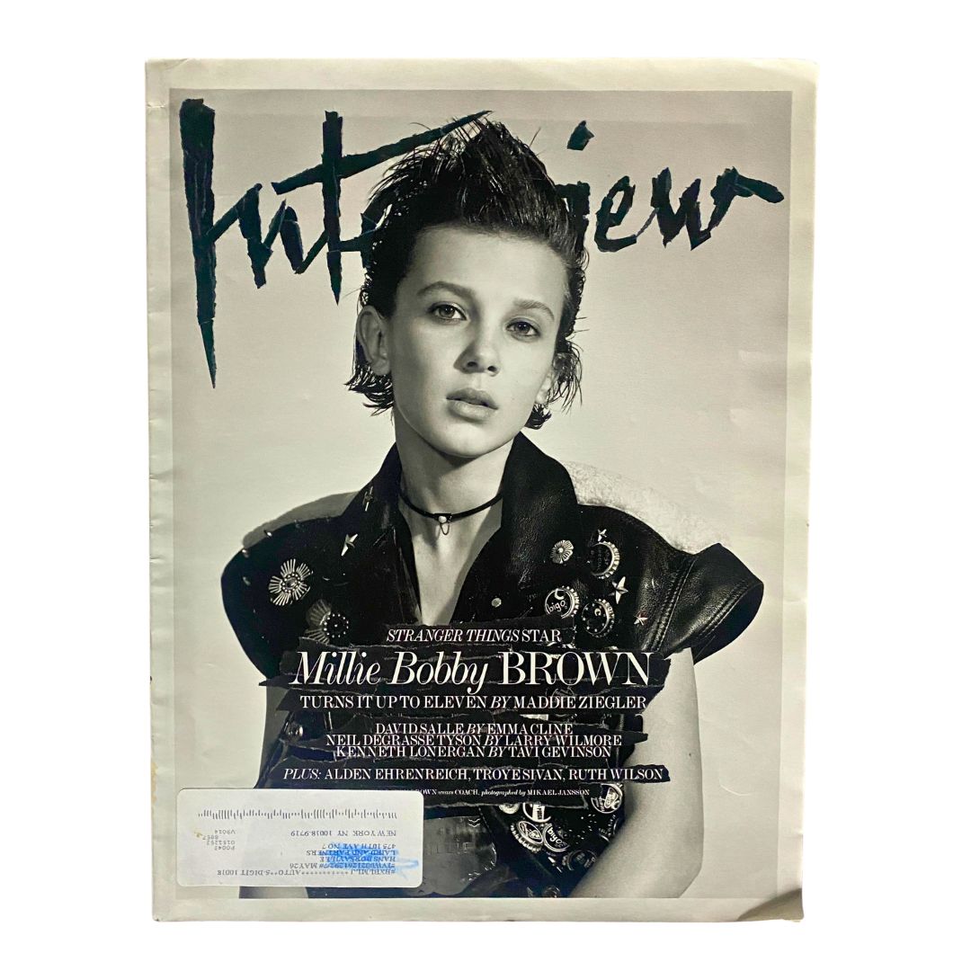 Cover of Interview Magazine November 2016 featuring Millie Bobby Brown, star of Stranger Things, showcasing her iconic style with a leather jacket and striking pose.