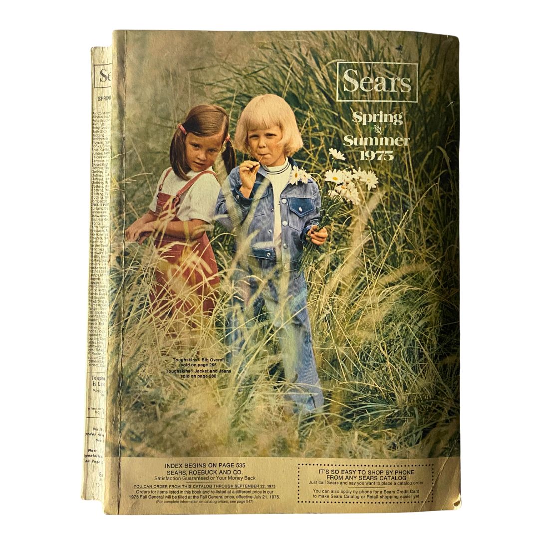 Cover of the 1975 Sears Spring Summer Toughskins Bib Overall, Jacket Jeans Catalog featuring two children in a grassy field, embodying classic 70s fashion.