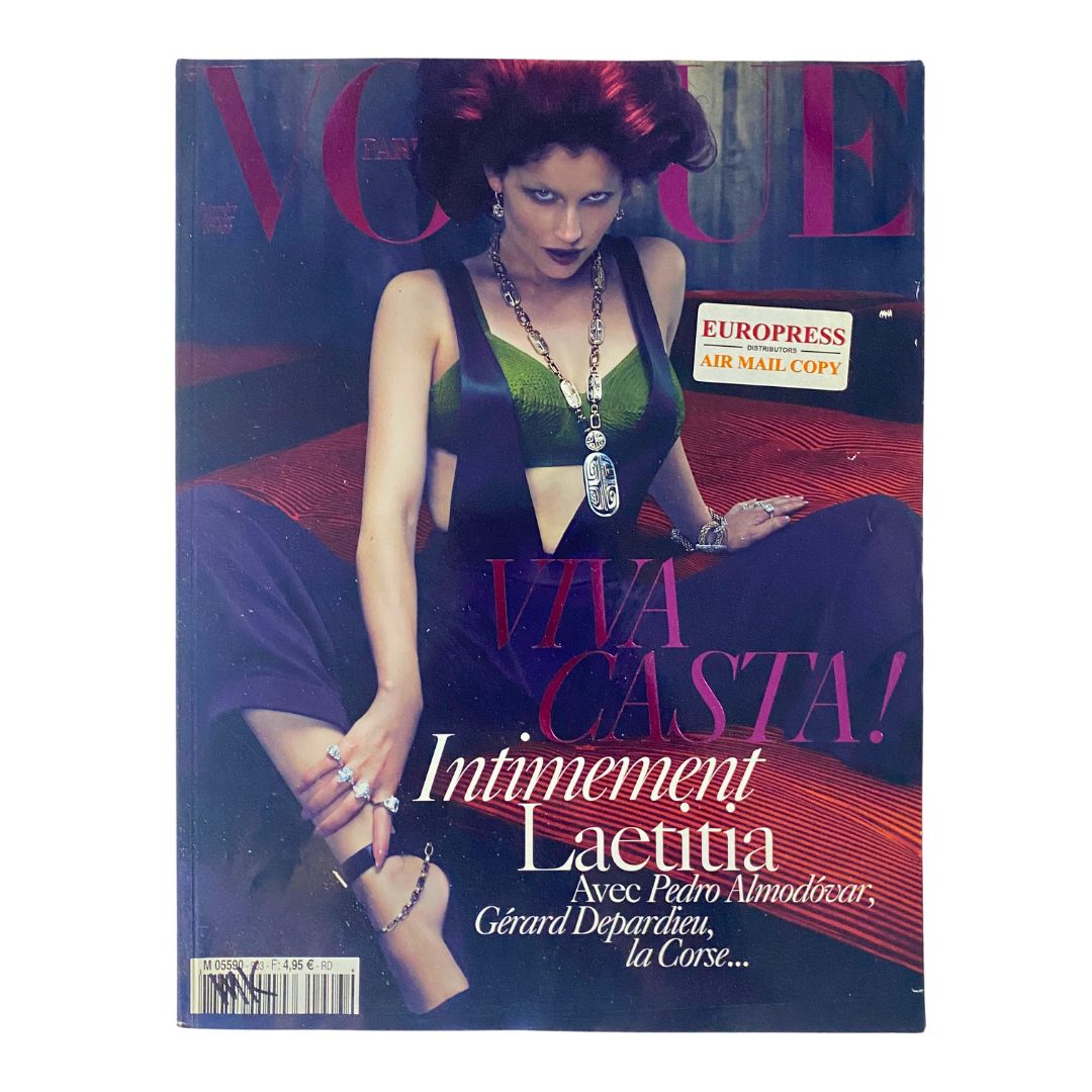 Vogue Paris Magazine December 2009/January 2010 Laetitia Casta cover featuring bold fashion and vibrant styling.