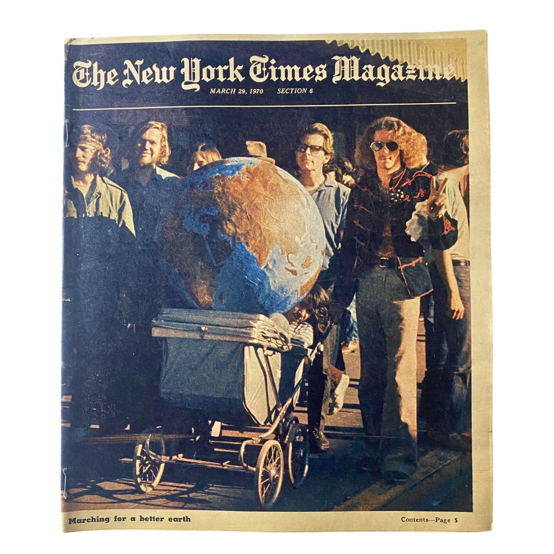 Cover of The New York Times Magazine March 29, 1970, featuring a crowd with a globe as a symbol for environmental awareness, titled 'Marching for a Better Earth'.