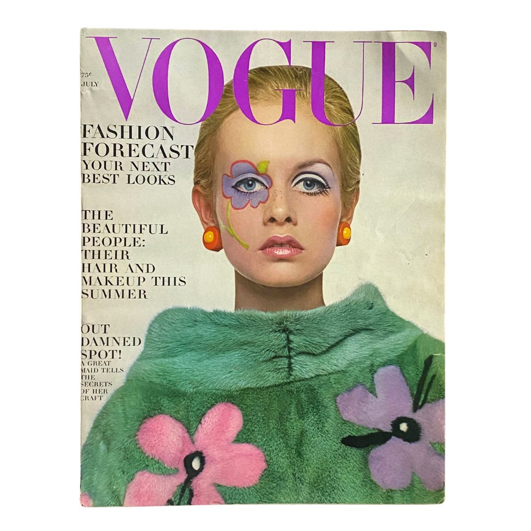 VTG Vogue Magazine July 1967 cover featuring Twiggy, photographed by Richard Avedon, showcasing bold fashion and makeup art.