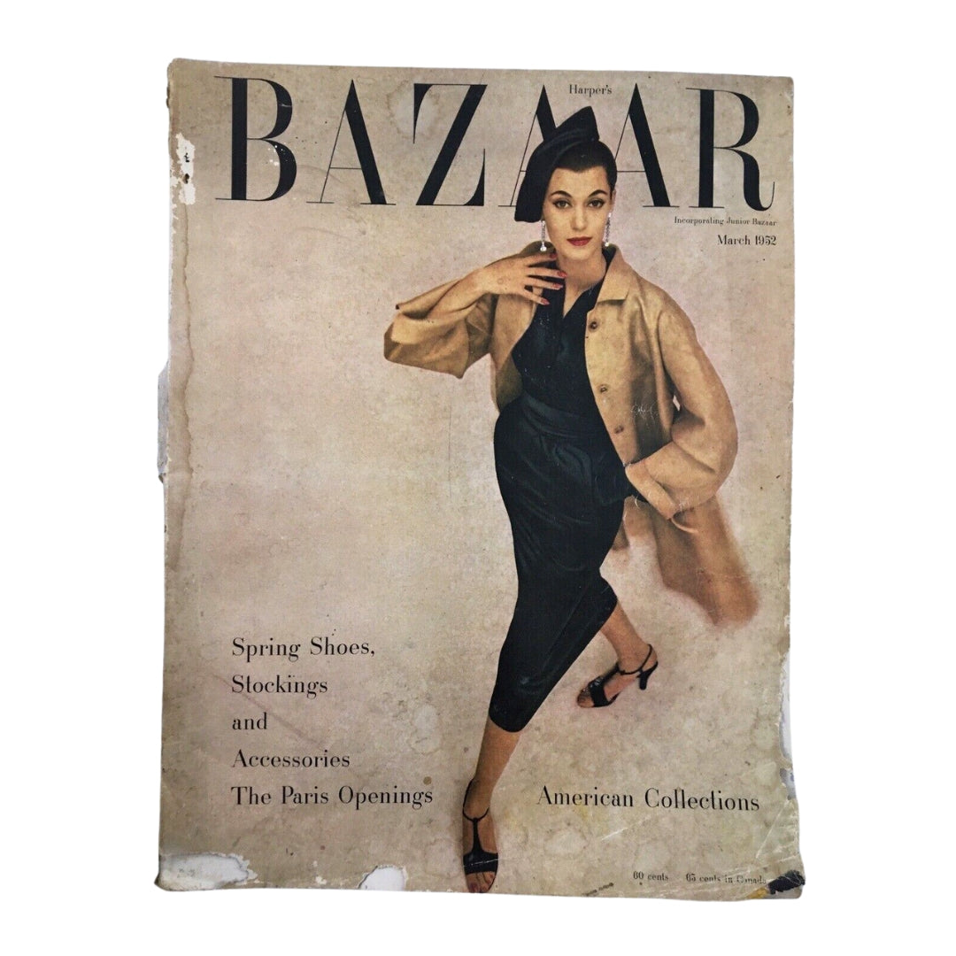 Cover of Harper's Bazaar March 1952 Fashion edition featuring a model showcasing mid-century style, with text highlighting 'Spring Shoes, Stockings, and Accessories' and 'The Paris Openings'.
