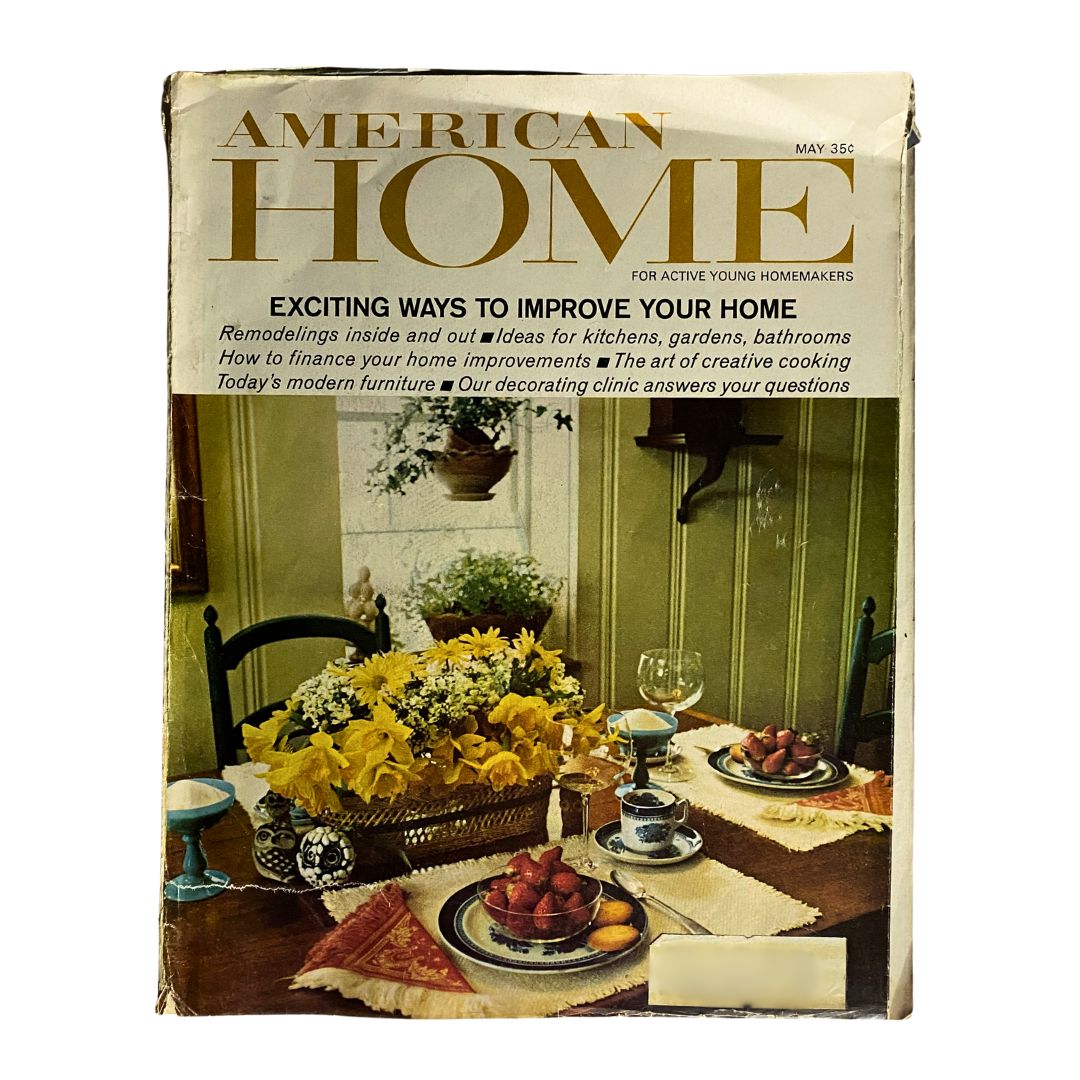 Cover of VTG American Home Magazine May 1967 featuring 'Exciting Ways To Improve Your Home' with a dining setup adorned with flowers and fruit, highlighting retro home decor ideas.
