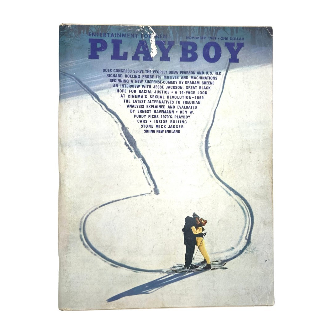 VTG Playboy Magazine November 1969 cover featuring an artistic snow-themed illustration, highlighting the title and a couple skiing, showcasing Claudia Jennings as the centerfold.