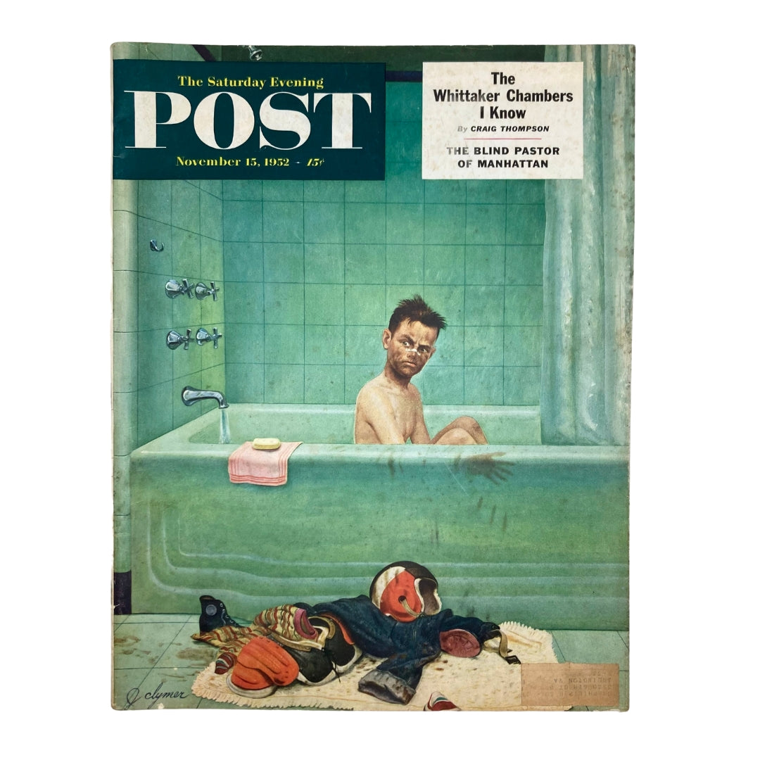 Cover of Saturday Evening Post Magazine November 15, 1952 with the title 'Gridiron Hero' illustrated by John Clymer, featuring a boy in a bathtub with various sports equipment scattered around.