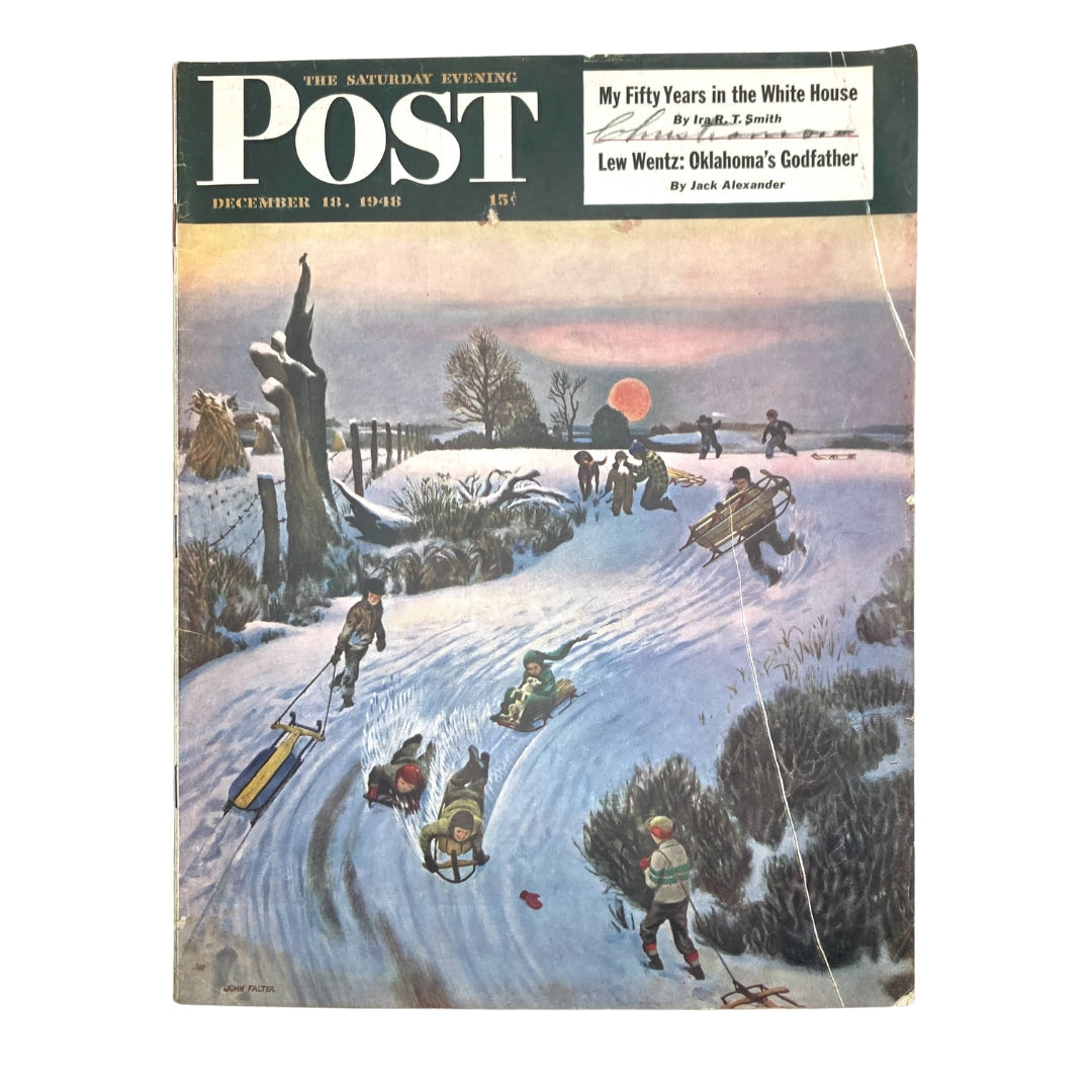 Cover of the Saturday Evening Post Magazine from December 18, 1948, illustrated by John Falter, featuring children sledding in a snowy landscape.