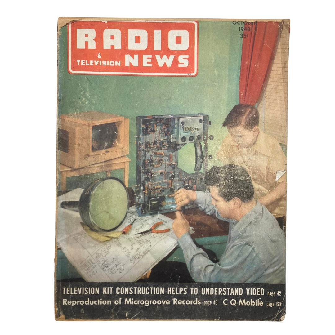 Cover of VTG Radio & Television News Magazine October 1948 showcasing two men working on television technology, featuring a vintage design and bright colors.