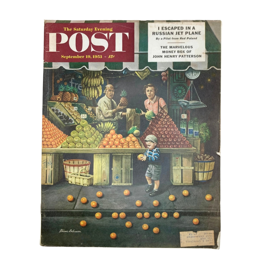 Cover of the Saturday Evening Post Magazine from September 19, 1953, featuring vibrant artwork titled 'Rolling Oranges' by artist Dohanos, depicting a fruit market scene with children and vendors.