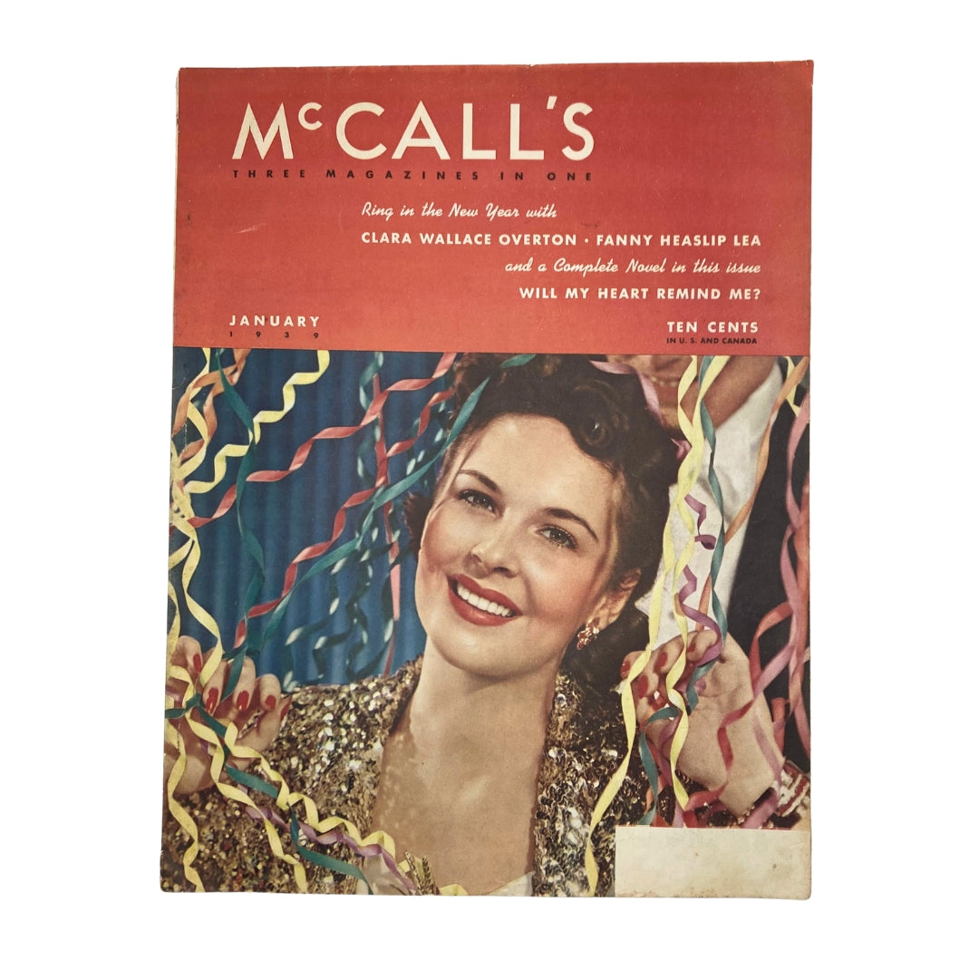 Cover of VTG McCall's Magazine January 1939 featuring Clara Wallace Overton's artwork, showcasing a glamorous woman with festive decorations.