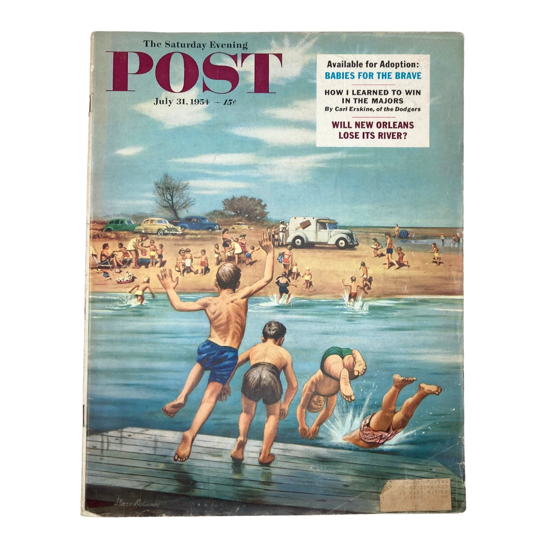 Cover of the Saturday Evening Post Magazine from July 31, 1954, featuring a colorful scene of children playing at a beach with a lake and vintage cars in the background.