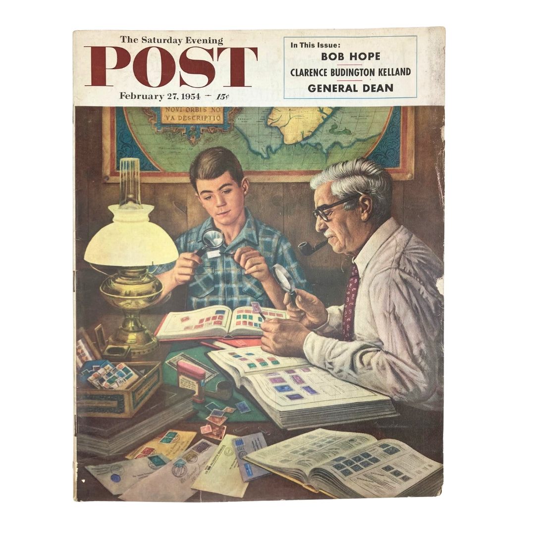 Cover of Saturday Evening Post Magazine February 27 1954, featuring a detailed illustration titled 'Amassing Stamps' by Robert A. Dohanos, showing a young boy and an older man engaged in stamp collecting.