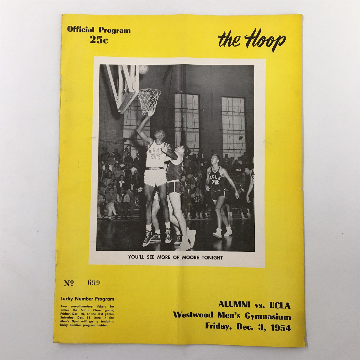 Cover of the December 3 1954 NCAA Basketball Alumni vs UCLA Official Program featuring a basketball player shooting a free throw in front of a vibrant yellow background.