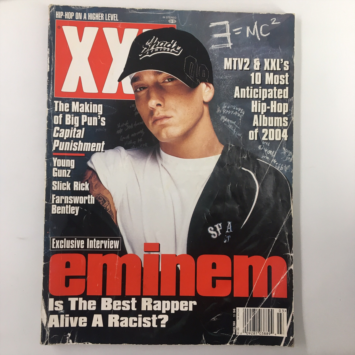 Cover of XXL Magazine March 2004 featuring Eminem with the headline 'Is The Best Rapper Alive? A Racist? No Label'. This vintage magazine showcases Eminem's influence on hip-hop culture and includes exclusive interviews.