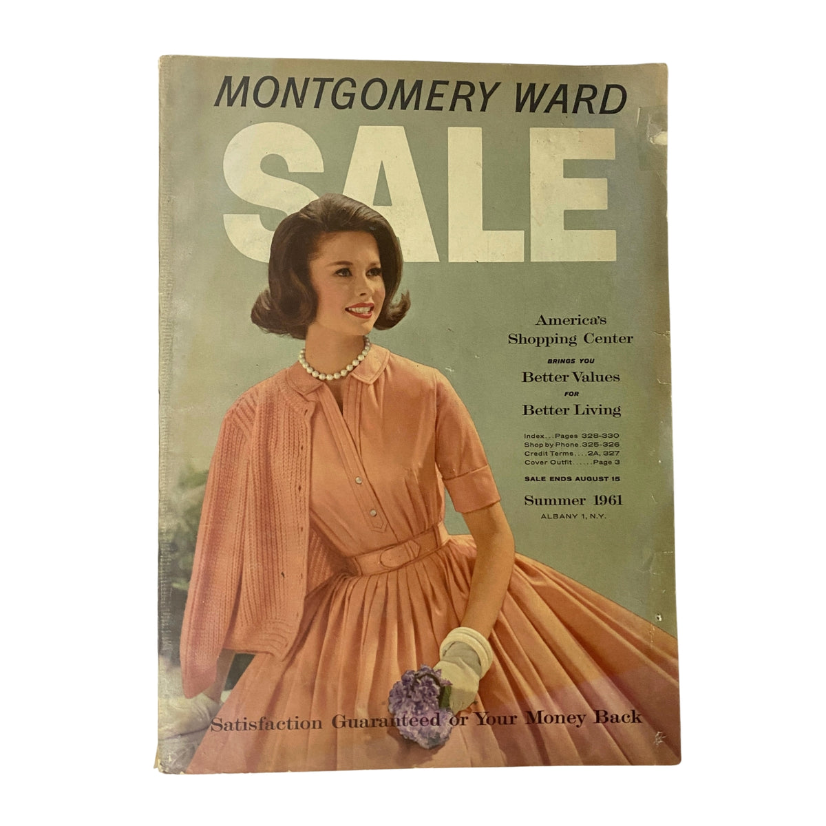 Cover of the 1961 Montgomery Ward Summer Catalog featuring a woman in a vintage pink dress with a pearl necklace, showcasing classic summer fashion.