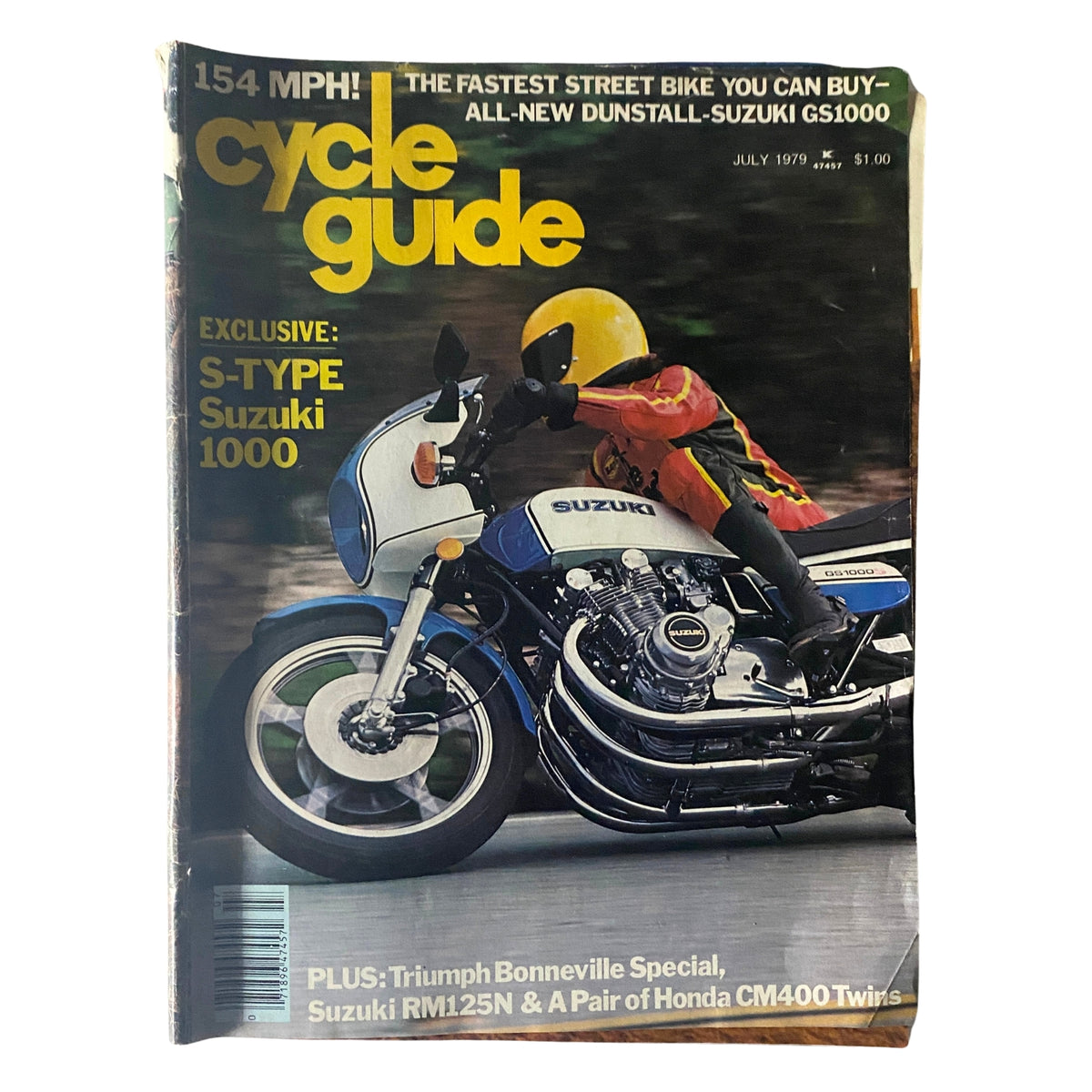 Cycle Guide Magazine July 1979 cover featuring the S-Type Suzuki 1000 motorcycle, showcasing its design and performance, accompanied by an image of a rider in vibrant gear.