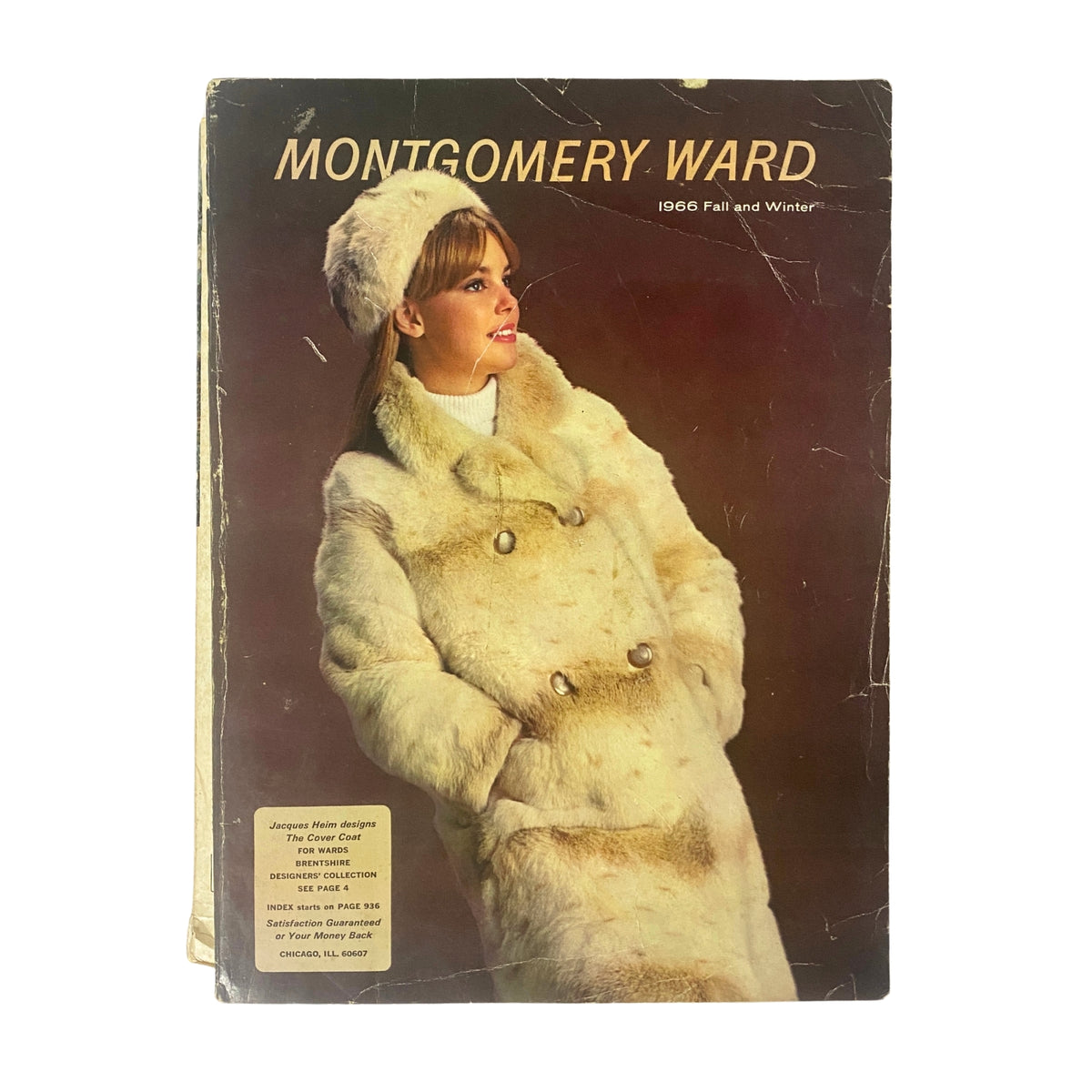 Cover of the 1966 Montgomery Ward Fall and Winter Catalog featuring a model in a chic faux fur coat and hat, showcasing vintage fashion.