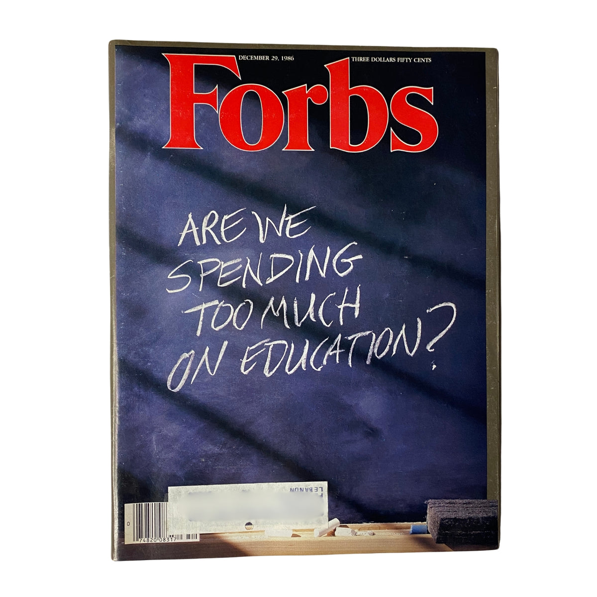 Forbes Magazine December 29, 1986 cover featuring the headline 'Are We Spending Too Much on Education?' highlighting educational spending concerns.