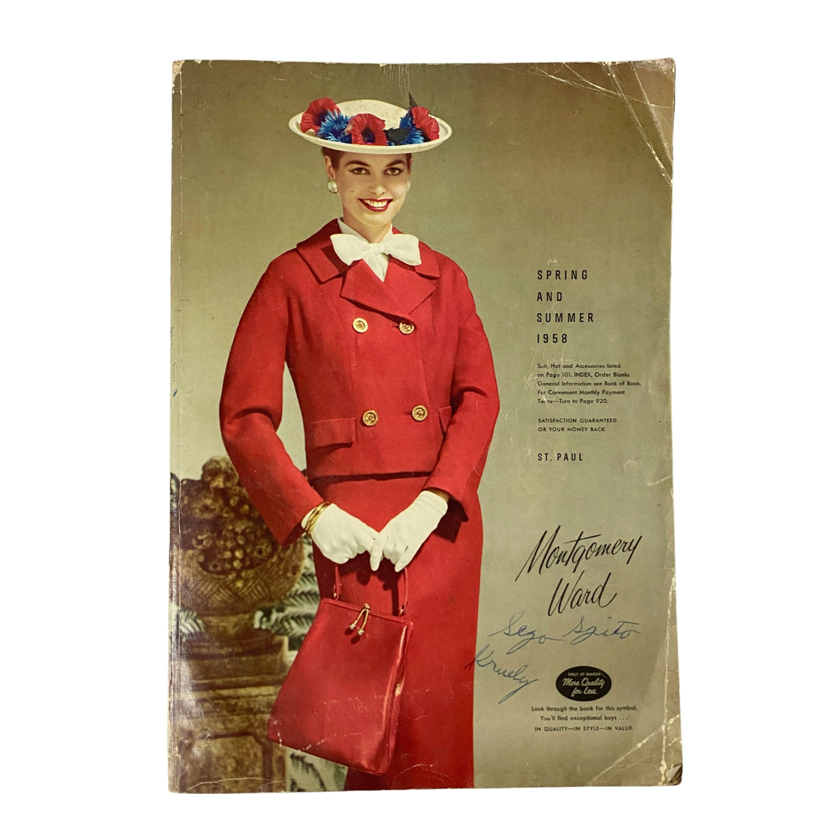 Cover of the 1958 Montgomery Ward Spring and Summer Catalog featuring a model in a red suit and hat with floral accents. The catalog showcases mid-century fashion trends.
